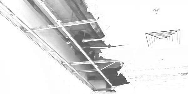 broken drywall in need of commercial drywall repair