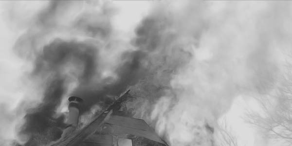 burning building in need of fire damage restoration