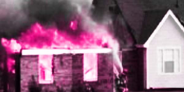 fire damage restoration - picture of house on fire