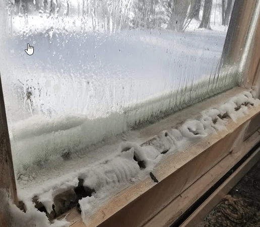 ice on inside of window ice on window
